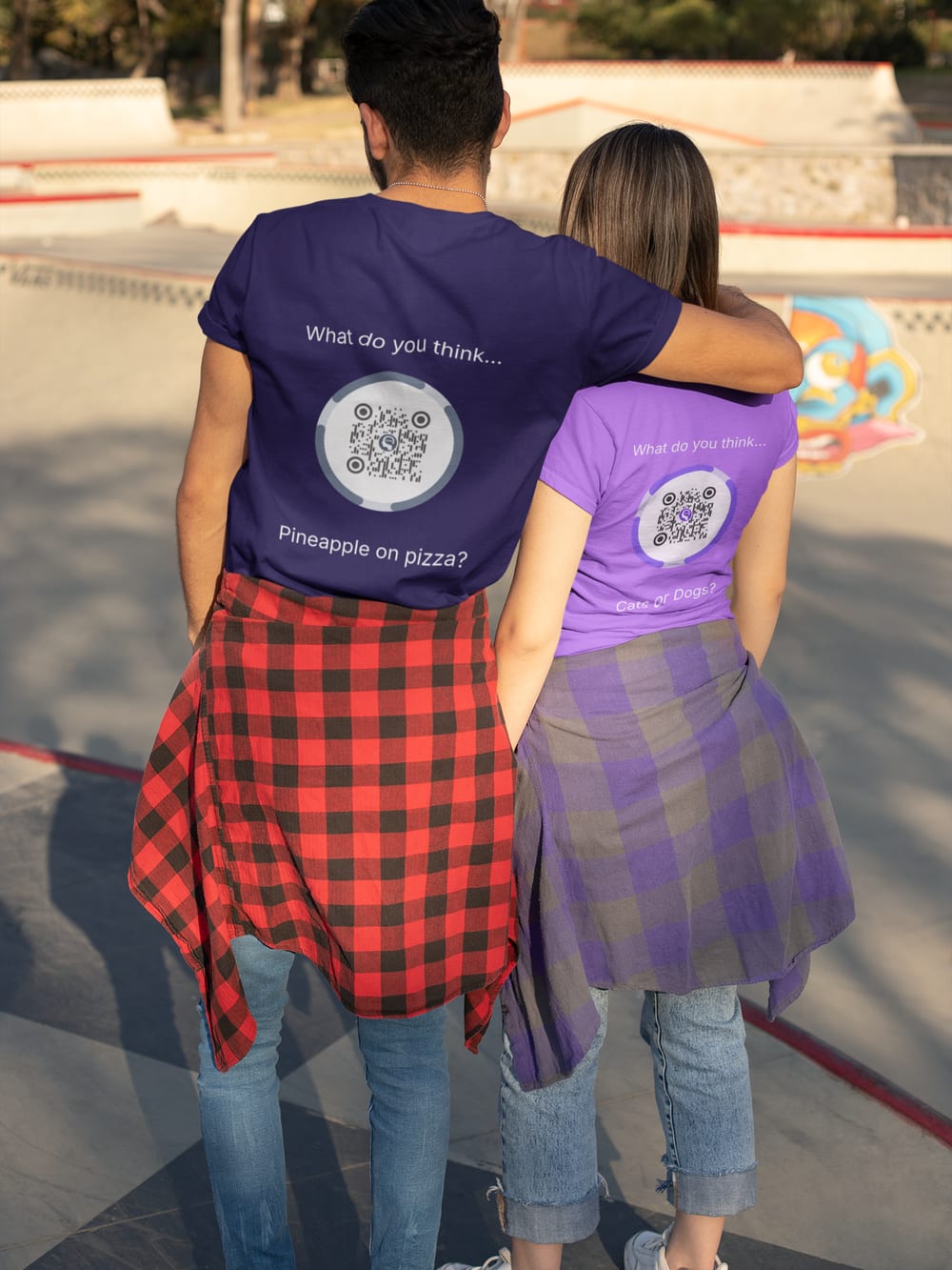Two people from behind wearing t-shirts with a Thoughtz Code printed between the shoulders.